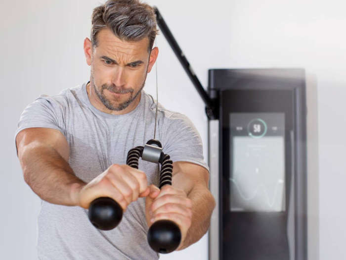 Tonal, an at-home strength-training system equipped with digital weights that use magnetic force instead of gravitational force, costs $2,995 for the system plus $49 a month for the class subscription.