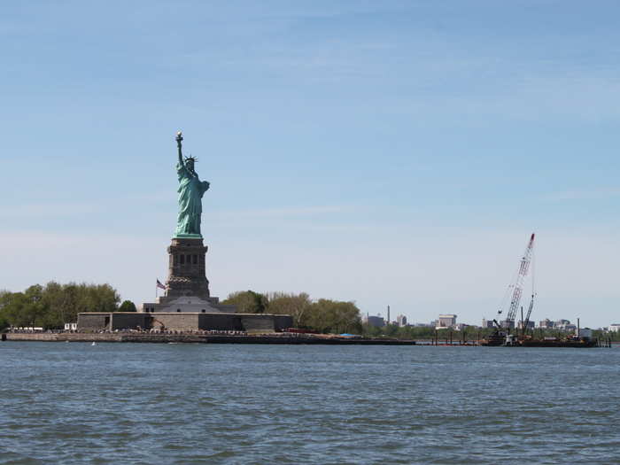 In reality, the island housing The Statue of Liberty and Ellis Island aren