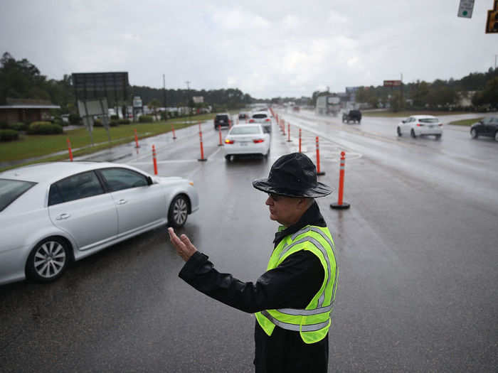 South Carolina Highway Patrol was on hand to direct traffic along the major roadways Gov. Henry McMaster announced would have reversed lanes to guide traffic away from the coast and assist the mass exodus.