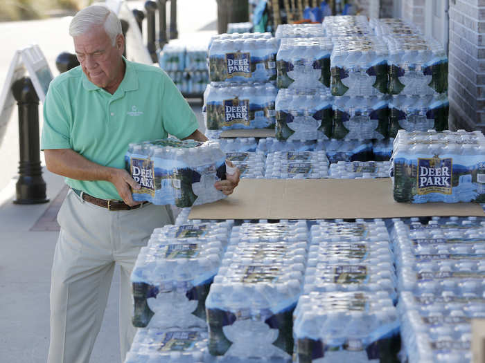 Residents also set out for other supplies, including water ...