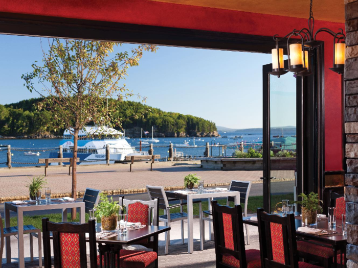 The restaurant opens up to a view of the harbor.