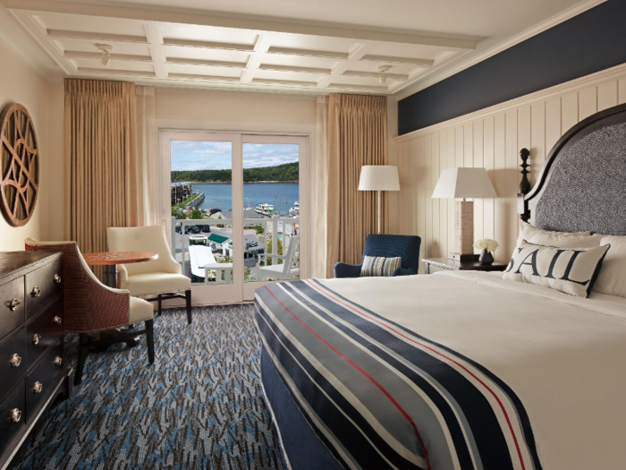 Each room comes with a private balcony, and some rooms offer panoramic views of the harbor.