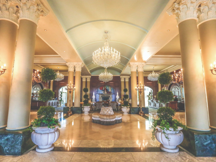 The lobby sets the tone of the hotel with its marbled floors and crystal chandeliers.