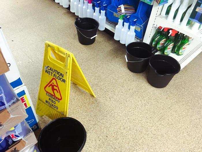 There were buckets scattered throughout the aisles because the roof was leaking.