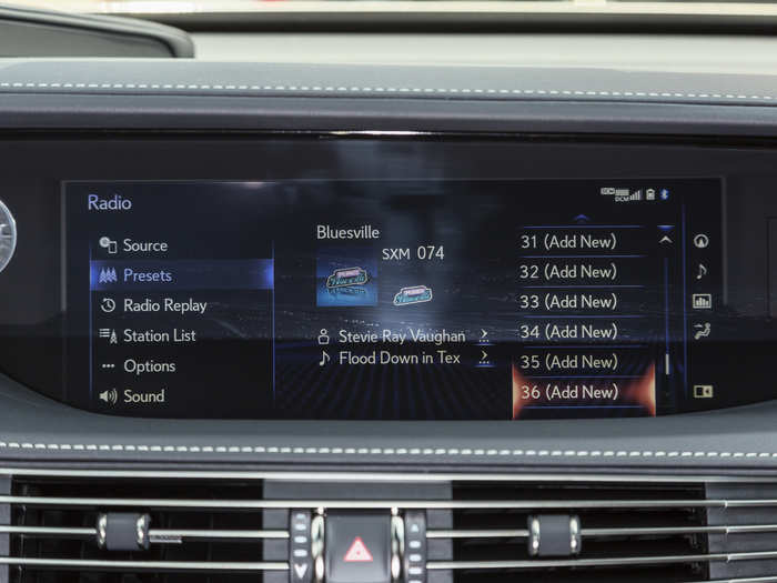 The front dash is dominated by a 12.3-inch widescreen infotainment display running the latest version of the Lexus Enform system.