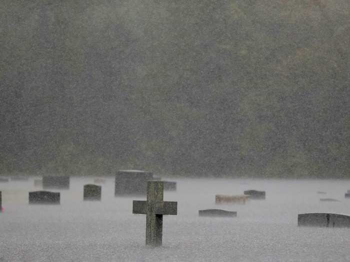 Heavy rains flooded a cemetery in Marion, South Carolina after Florence was downgraded to a tropical depression.