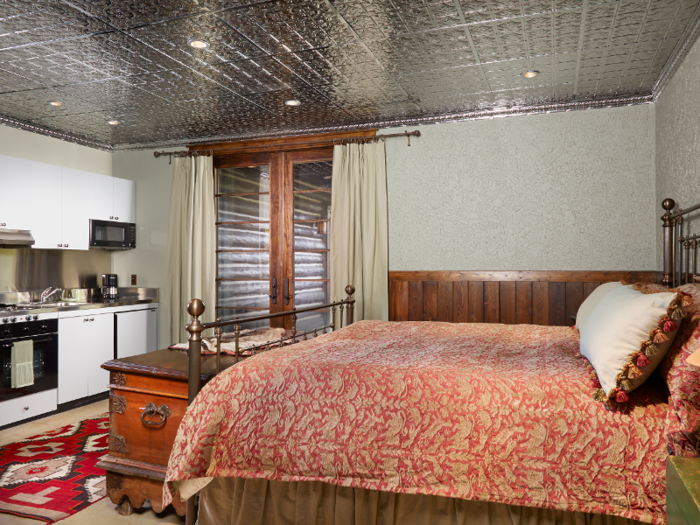 The main cabin includes two guest suites with kitchenettes.