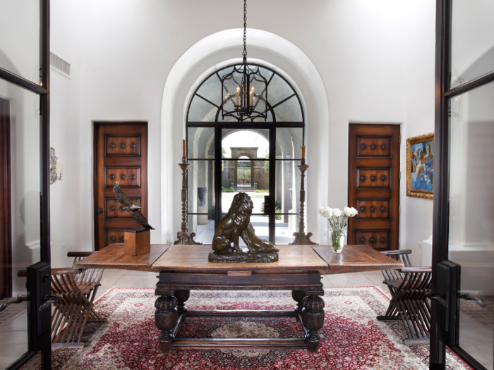 The foyer welcomes guests into the home and leads to the great room.