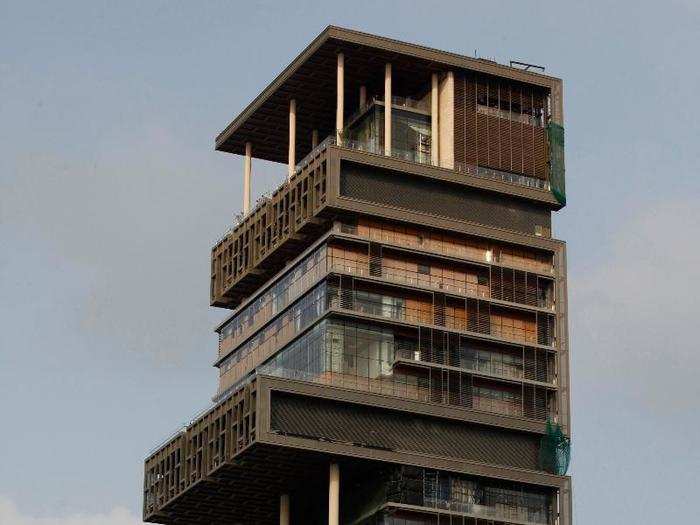 Billionaire Mukesh Ambani lives in a 27-story skyscraper with his family.