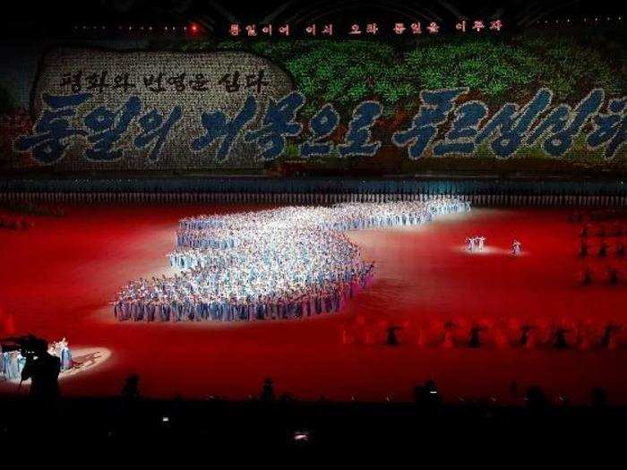 Performers position themselves to depict a unified Korean Peninsula.