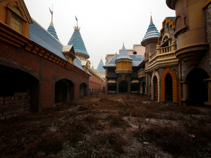 Half-finished, decrepit structures sat for years on the land that was meant to be the largest amusement park in all of Asia. In 2013, the majority of the park, including this medieval-looking fortress, was demolished.