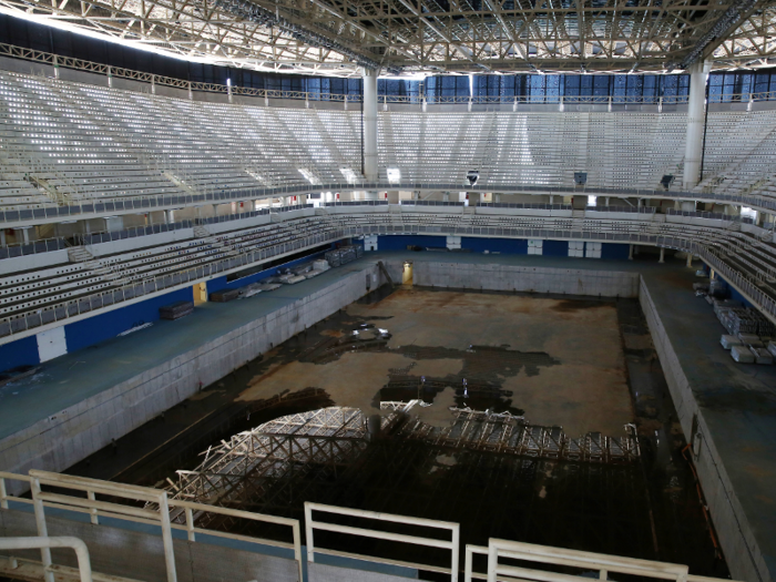 Huge, dirty puddles now stand where Olympians once swam.