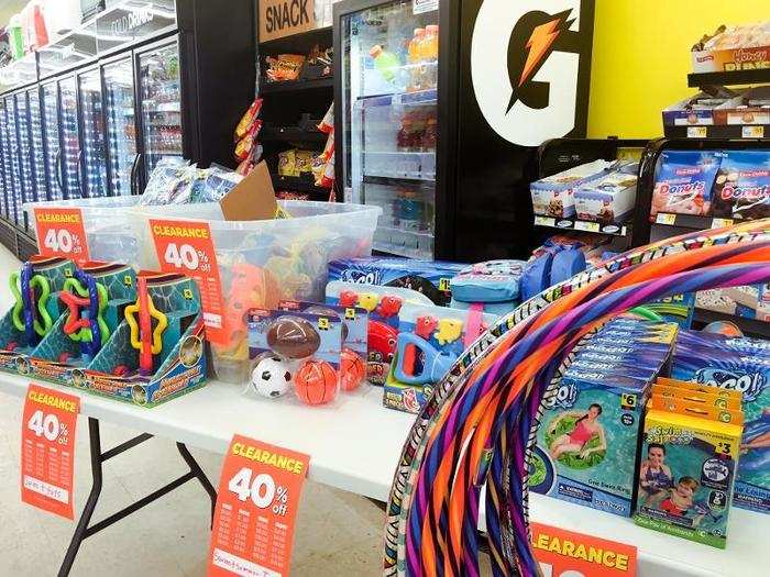 The front of the store had a clearance table with seasonal summer products.