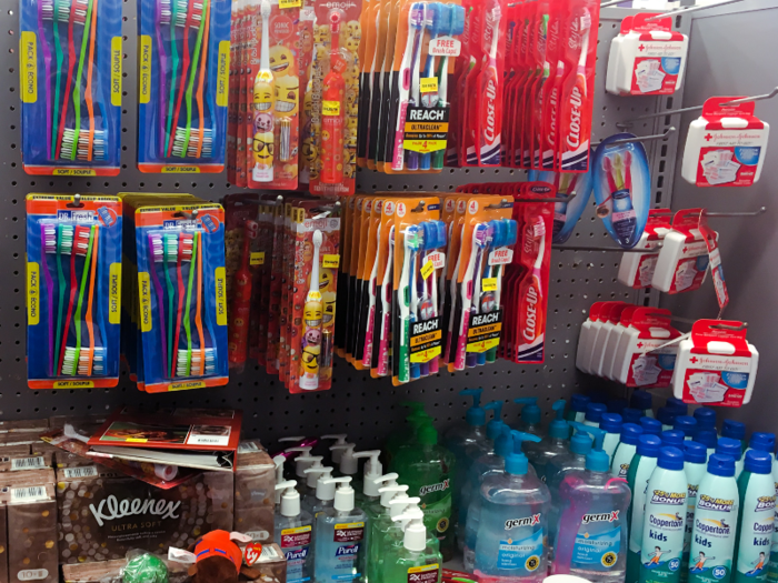 Near the front of the store were essentials like toothbrushes, first-aid supplies, and tissues.