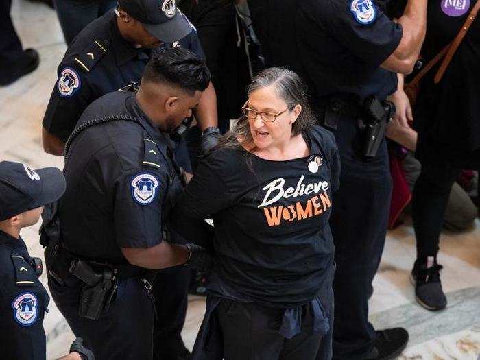 Police reportedly arrested dozens of protesters outside the offices of a number of senators.