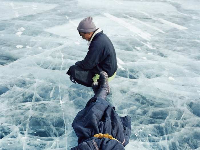 In 2006, Lagrange and his team were driving over Khovsgol Lake, a common shortcut when it is frozen in the winter. He spotted these two men one morning on the lake, drunk on cheap vodka.