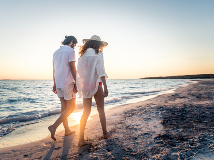 ... or of strolling along a pristine white beach devoid of any other human life.