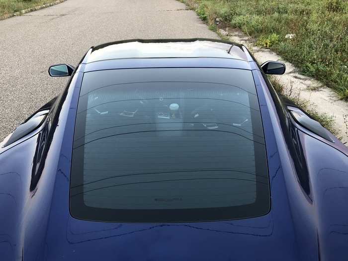 The fastback hatch sweeps boldly from the carbon-fiber targa roof.