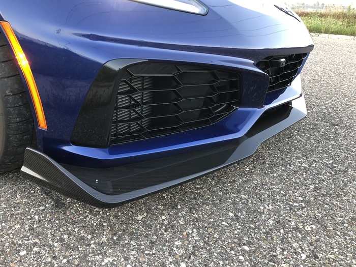 Front aero shapes the air around the intake scoops in the ZR1 shapely maw.