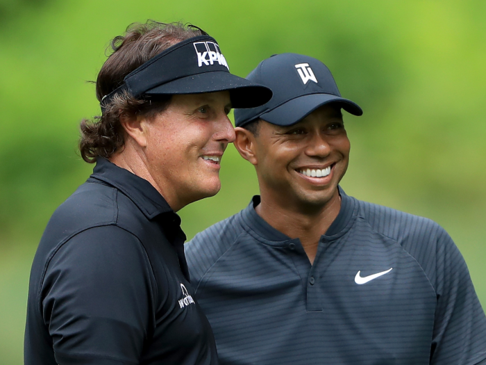 2. Who will Tiger Woods partner with?