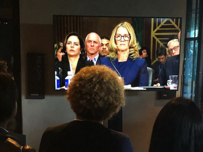 Women attending a summit hosted by The New York Times in Brooklyn took a break to watch Ford speak.