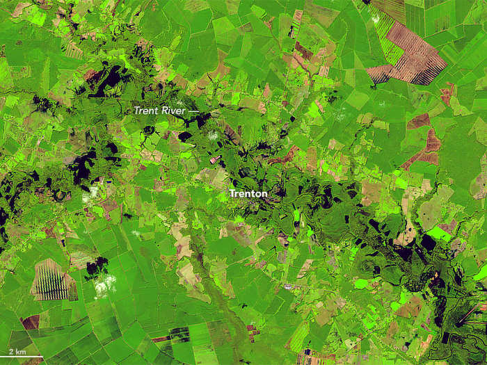 All of that water had to go somewhere. By September 17, 2018, the Trent River crested at nearly 30 feet — double the height where floods for the river begin. Nearby farms, homes, and businesses were inundated, as this picture from September 19 shows.