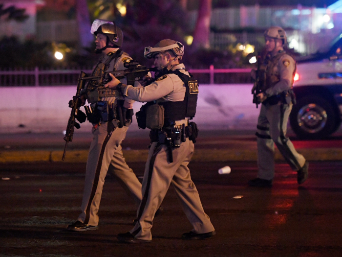 10:24 p.m.: Police officers gather near Paddock