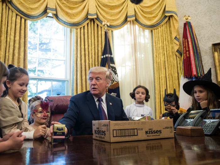 Costumed children of journalists and White House staffers were invited to the Oval Office in 2017 to meet President Trump.