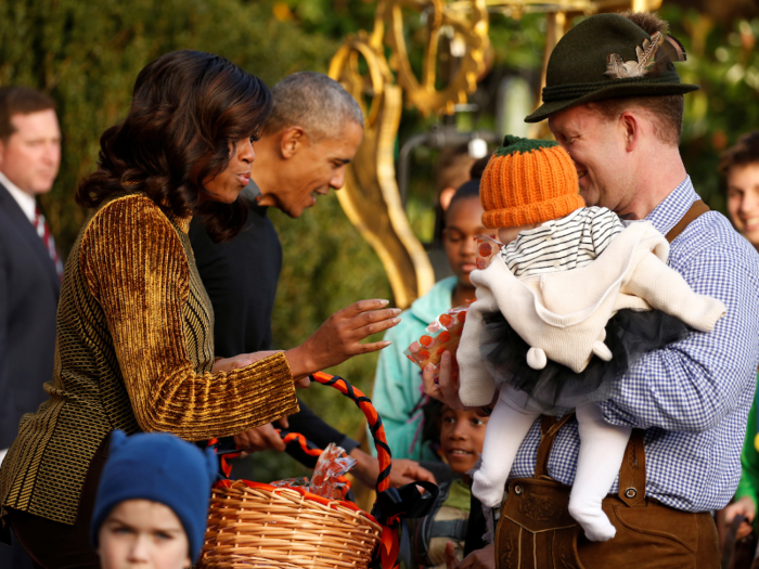 Obama and the first lady gave out Halloween treats to children on October 31, 2016.