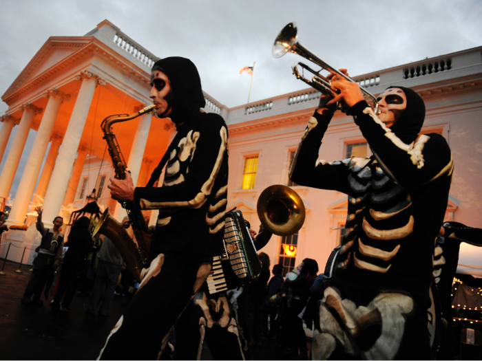 As children waited in line to trick-or-treat at the White House in 2009, performers like this skeleton band kept them entertained.