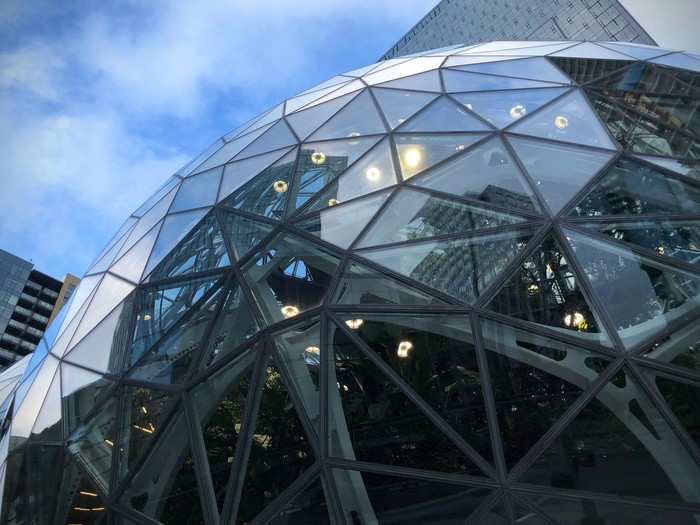 The largest sphere, the one in the middle, is 90 feet high and 130 feet wide. Amazon used 620 tons of steel, 12 million pounds of concrete, and 2,642 glass panes to build the Spheres.