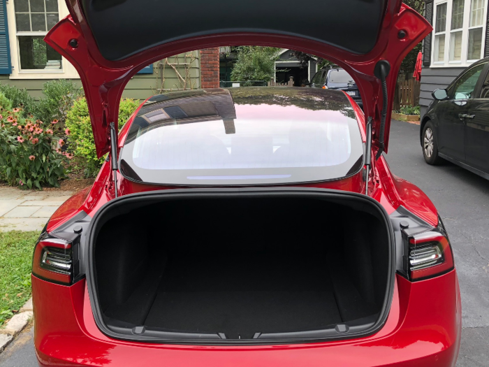 The Model 3 has plenty of trunk space — and an offbeat hatch design to enable that continuous glass roof.