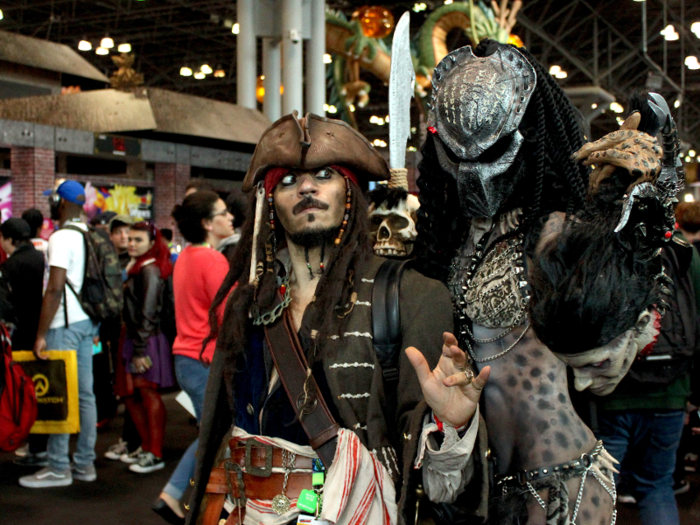 "I painted it, glued it together, made my chain and everything," Chula said, posing with a Jack Sparrow from Pirates of the Caribbean cosplayer.