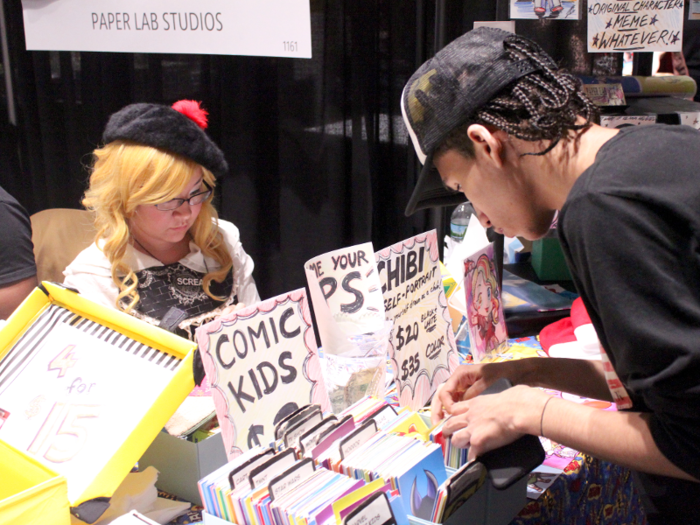 But most of their day is spent chatting with Comic Con attendees and taking their varying requests.