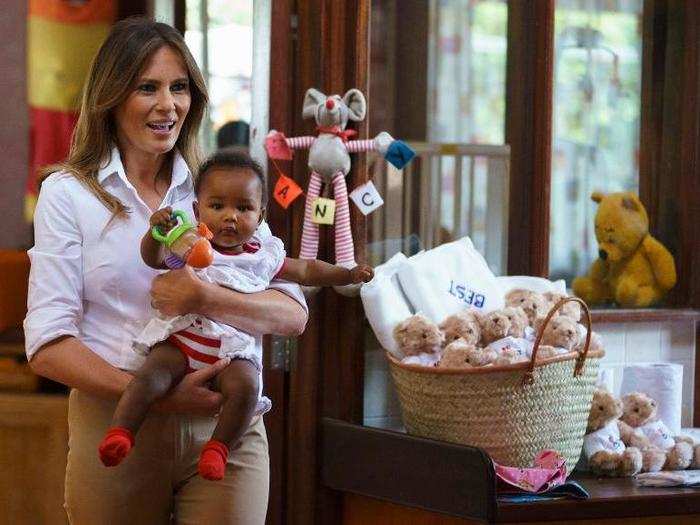 Like her first stop at a hospital in Ghana, the first lady handed out teddy bears and blankets with her initiative