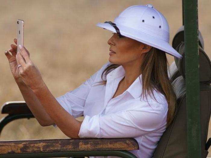 At several points during the safari, the first lady took out her cellphone to take pictures of the wildlife.