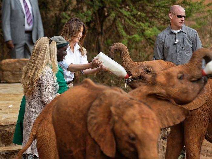 She was given the opportunity to bottle-feed and pet orphaned elephant calves during the visit.