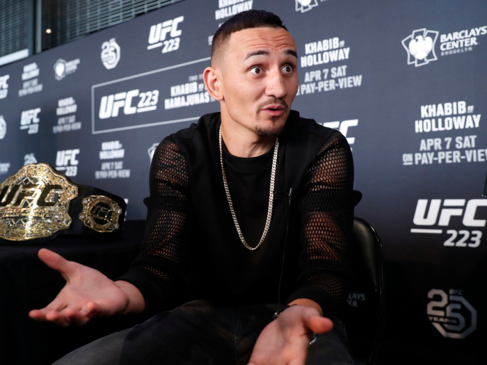 Holloway is 19-3 as of today and owns the 145-pound belt.