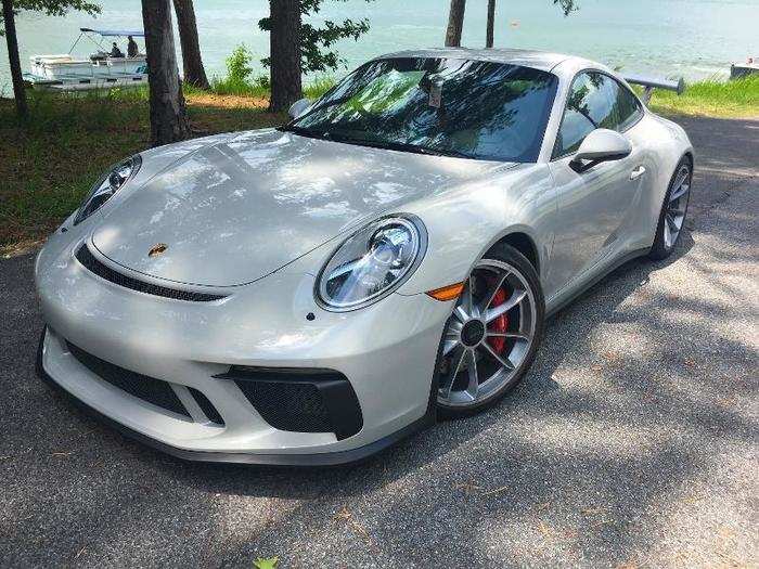 ...The GT3 is more aggressive with pronounced front aero treatments and air intakes.