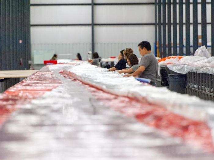 Assembling a balloon requires anywhere from 100 to 200 panels of plastic, which give the inflated dirigible its shape.