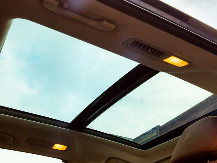 The optional panoramic sunroof floods the cabin with light. Even though, it robs the first and second row passengers of about an inch of headroom, it