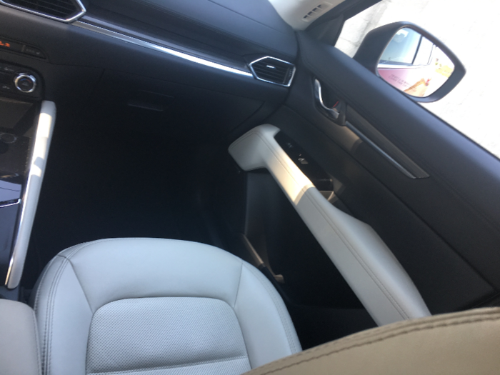 I found the white leather-trimmed seats in our test car to be well bolstered and comfortable with good adjustability.