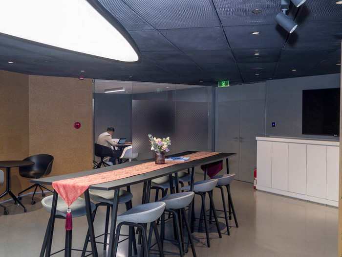 The company views the upstairs area as a mix between a club and a co-working space. They are targeting busy and well-off urban Chinese who may need a quick conference room to present their startup pitch to investors.