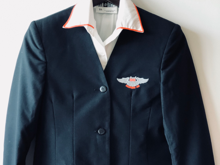 "I had a navy blue dress with like, a little orange scarf," former Hooters Air flight attendant Sara Nitz told Business Insider. "Very professional."