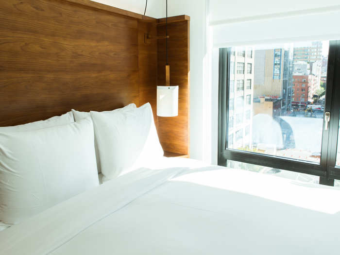 The rooms are all outfitted with floor-to-ceiling windows to make the space seem larger.