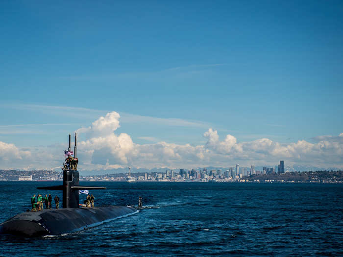 The Los Angeles-class fast-attack submarine USS Olympia (SSN 717) arrives at Naval Base Kitsap-Bremerton for a namesake visit on March 16, 2018.