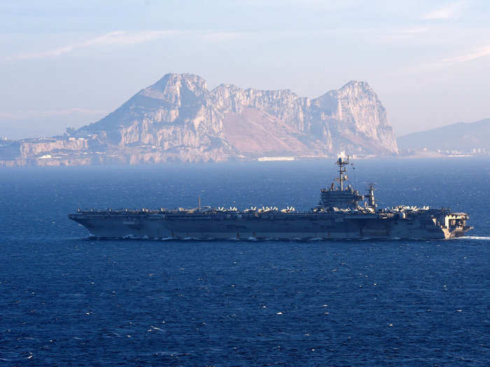 The Nimitz class aircraft carrier USS Harry S. Truman (CVN 75) conducts a strait transit on June 28, 2018.