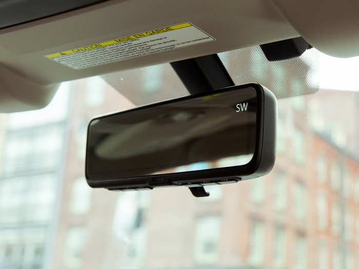 Above the driver is a rear-view mirror that can double as a digital display.