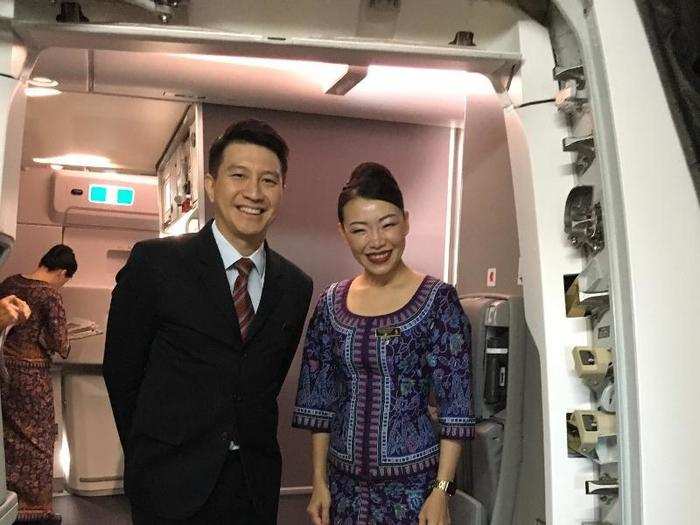 At the boarding door, we are greeted by Singapore Airlines cabin crew.