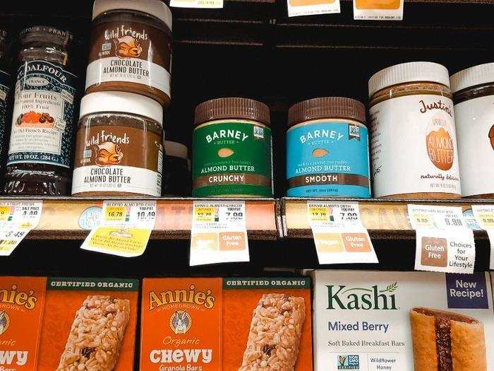 The natural-foods aisle carried a lot of products like cereal, granola bars, and nut butters. A 10 oz. jar of almond butter cost $7.99.